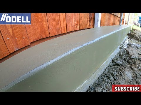 How to Make a Concrete Curb for a Fence